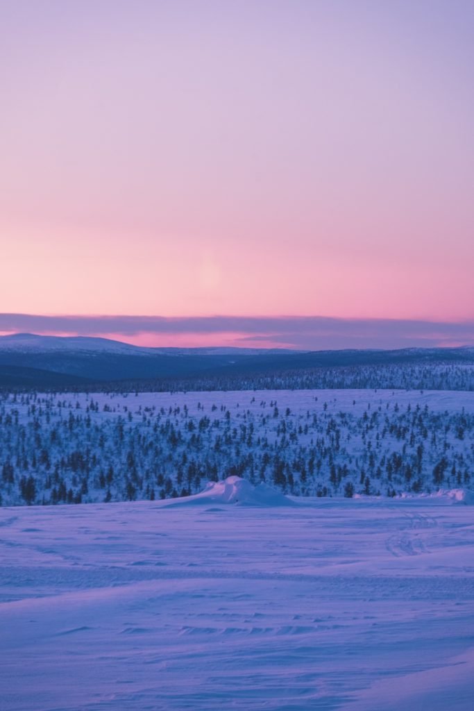 staying in a glass igloo in Finland